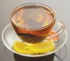 hot-tea-with-lemon-in-glass-cup-saucer.jpg