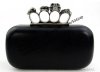 Classic-skull-rings-clutch-handbag-solid-black-white-colors.jpg