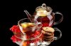 11194602-glass-teapot-and-cup-with-black-fruit-tea-and-cookies-isolated-on-white.jpg