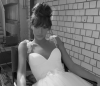 inbal-dror-haute-couture-wedding-gown-strap-gown-bow-tie-at-shoulders.png