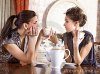 two-pretty-girl-friends-drink-tea-14556741.jpg