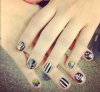 Demi-Lovato-And-Her-Manicure-Nail-Art-3-kits-For-the-Same-4.jpg