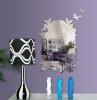 wall-mirror-stickers-by-tonka-design-1-554x569.jpg