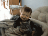 Baby_hugs_cat.gif