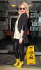 Rita-Ora-Bananas-and-Smiley-face-boots-in-london.png