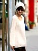 Katie Holmes in white sweater and hat.jpg