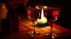 stock-footage-a-candle-present-two-glass-of-wine-on-the-table-a-beautiful-evening-for-two.jpg