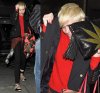 miley-cyrus-enters-club-fully-clothed-leaves-in-bra-01-1-horz.jpg