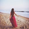 girl-with-long-hair-and-maxi-dress-on-beach.jpg