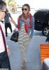 Miranda-Kerr-wore-scarf-denim-jacket-she-caught-flight-out.jpg