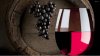 Red Wine Glass N Hanging Black Grapes Closeup.jpg