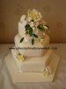 Ivory&yellow flowers wedding cake.JPG