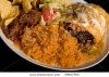 a-delicious-plate-of-mexican-food-close-up-of-a-smothered-burrito-with-mexican-rice-re-fried.jpg