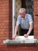 Man_Looks_Out_from_Window_-_Giessen_-_Germany-480x640.jpg
