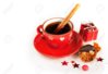 21971164-Hot-winter-coffee-with-cinnamon-sticks-cookies-and-christmas-gift-Stock-Photo.jpg