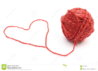 heart-shape-wool-ball-white-background-closeup-red-35225074.jpg