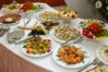 white-table-with-white-plates-of-food.jpg