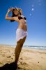 stretching_on_the_beach_by_jjimages-d3hw7sv.jpg