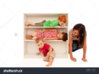 stock-photo-three-kids-playing-hide-and-seek-on-bookshelf-with-mum-looking-46111876.jpg