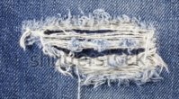 stock-photo-jeans-torn-denim-texture-271953710.jpg