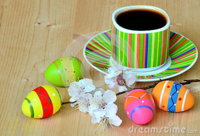 easter-eggs-near-colored-cup-coffee-apple-tree-flowers-69050996-1.jpg
