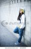 stock-photo-beautiful-asian-girl-in-hip-hop-style-standing-in-block-wall-44048695.jpg