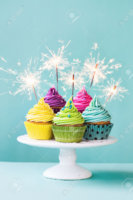 36056523-Colorful-cupcakes-decorated-with-sparklers-Stock-Photo-birthday-cupcake-cupcakes.jpg