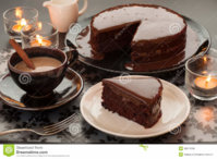 still-life-chocolate-cake-cup-coffee-sweet-dessert-bottle-milk-candlelight-table-33621590.jpg