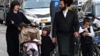 Hasidic_Family_in_Street_-_Borough_Park_-_Hasidic_District_-_Brooklyn-e1474540554540-635x357.jpg