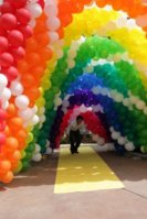 82228acb39ebad25d349f7bef03e4fc7--rainbow-balloon-arch-white-balloons.jpg