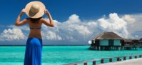 woman-on-a-tropical-beach-jetty-at-maldives-stock-photo-image-id-131839208-1422444705-EVnJ.jpg