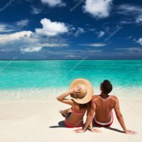 depositphotos_21611147-stock-photo-couple-on-a-beach-at.jpg