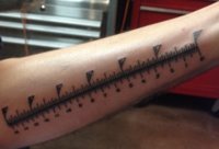 Ruler-Tattoo-500x500.jpg