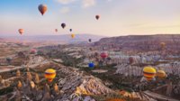 hot-air-balloon-flying-over-cappadocia-1534391901-1000X561.jpg