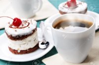 12455388-homemade-cream-cherry-cake-and-coffee-cup.jpg