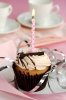 Birthday cupcake pink candle chocolate shaving.jpg
