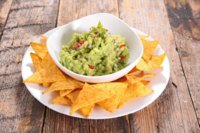 depositphotos_114073804-stock-photo-guacamole-sauce-dip-with-nachos.jpg