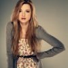 10630857-a-beautiful-young-woman-is-in-brown-clothes.jpg