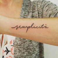 One Word Tattoos Design on Arms.JPG