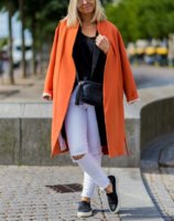 white_jeans_orangecoat.jpg