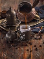 128203134-fresh-breved-coffe-in-cezve-in-traditional-turkish-coffee-pot.jpg