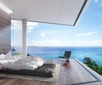 luxury-bedroom-with-a-panoramic-ocean-view-300x250.jpg