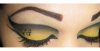 yellow_leopard_eye_shadow_by_Trannsylvanian.jpg