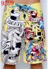 yellow-eagle-skull-ed-hardy-beach-shorts.jpg