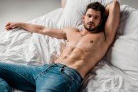handsome-sexy-shirtless-man-jeans-lying-bed-grey-sexy-shirtless-man-jeans-lying-177347048.jpg