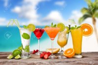 14389862-summer-cocktails-with-blur-beach-on-background.jpg