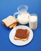 8922917-several-bread-slices-with-chocolate-cream-and-glasses-of-milk.jpg