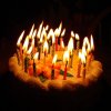 Birthday_Cake_with_Lit_Candles_by_FantasyStock.jpg