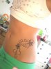 Lower Stomach Tattoos for Girls.jpg