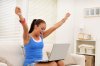 happy-woman-cheering-at-computer.jpg